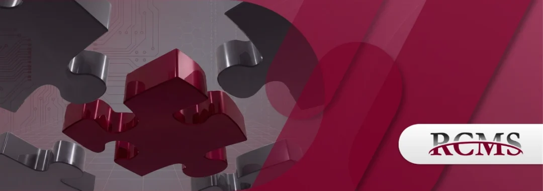 Red and silver puzzle pieces fitting together over a digital circuit board background