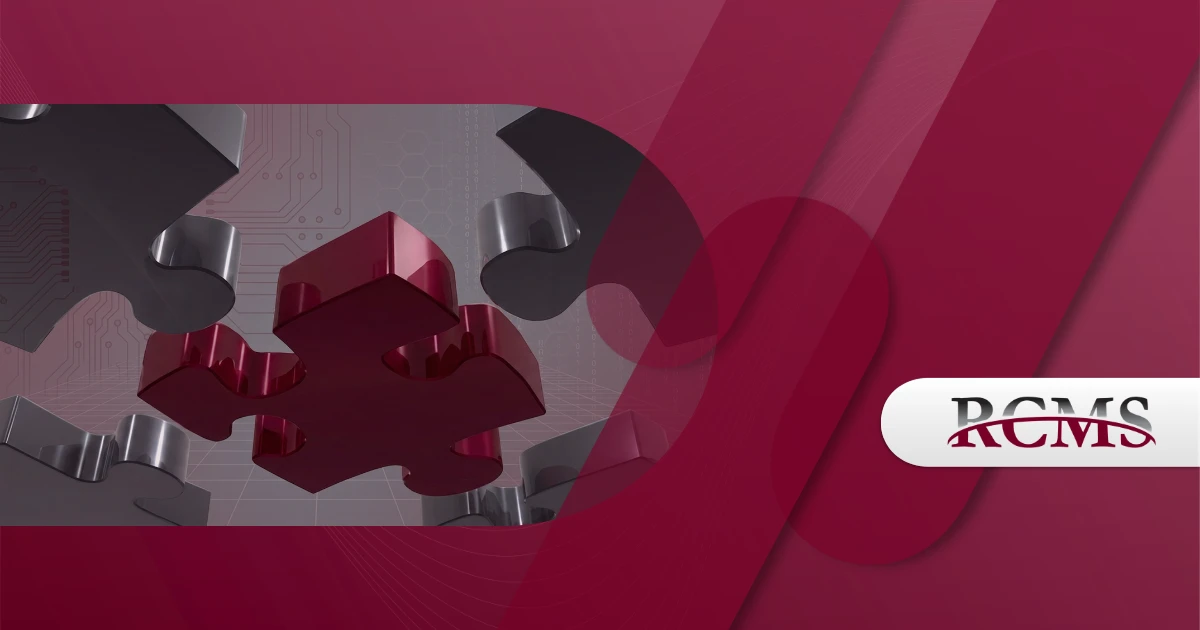 Red and silver puzzle pieces fitting together over a digital circuit board background